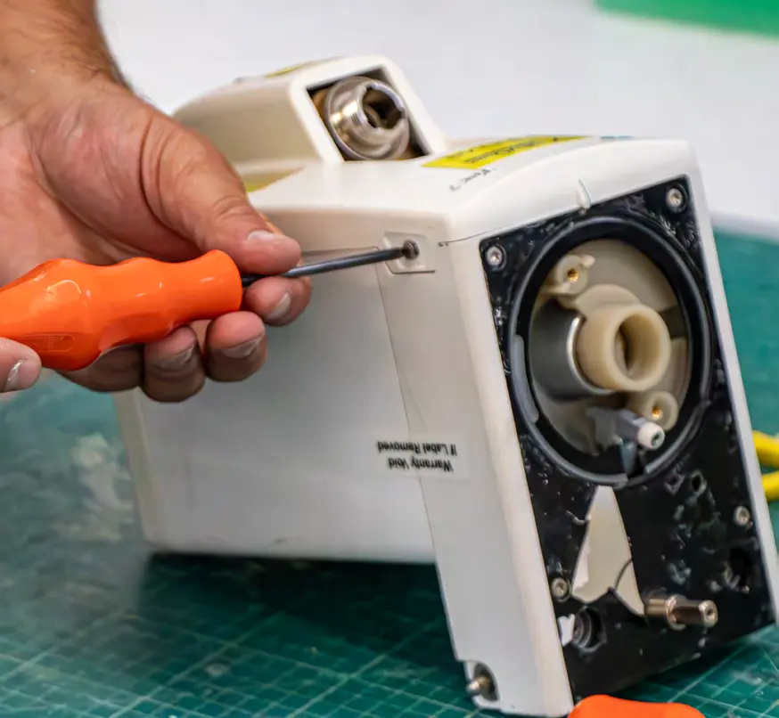 G.A.S. technician servicing anaesthetic equipment